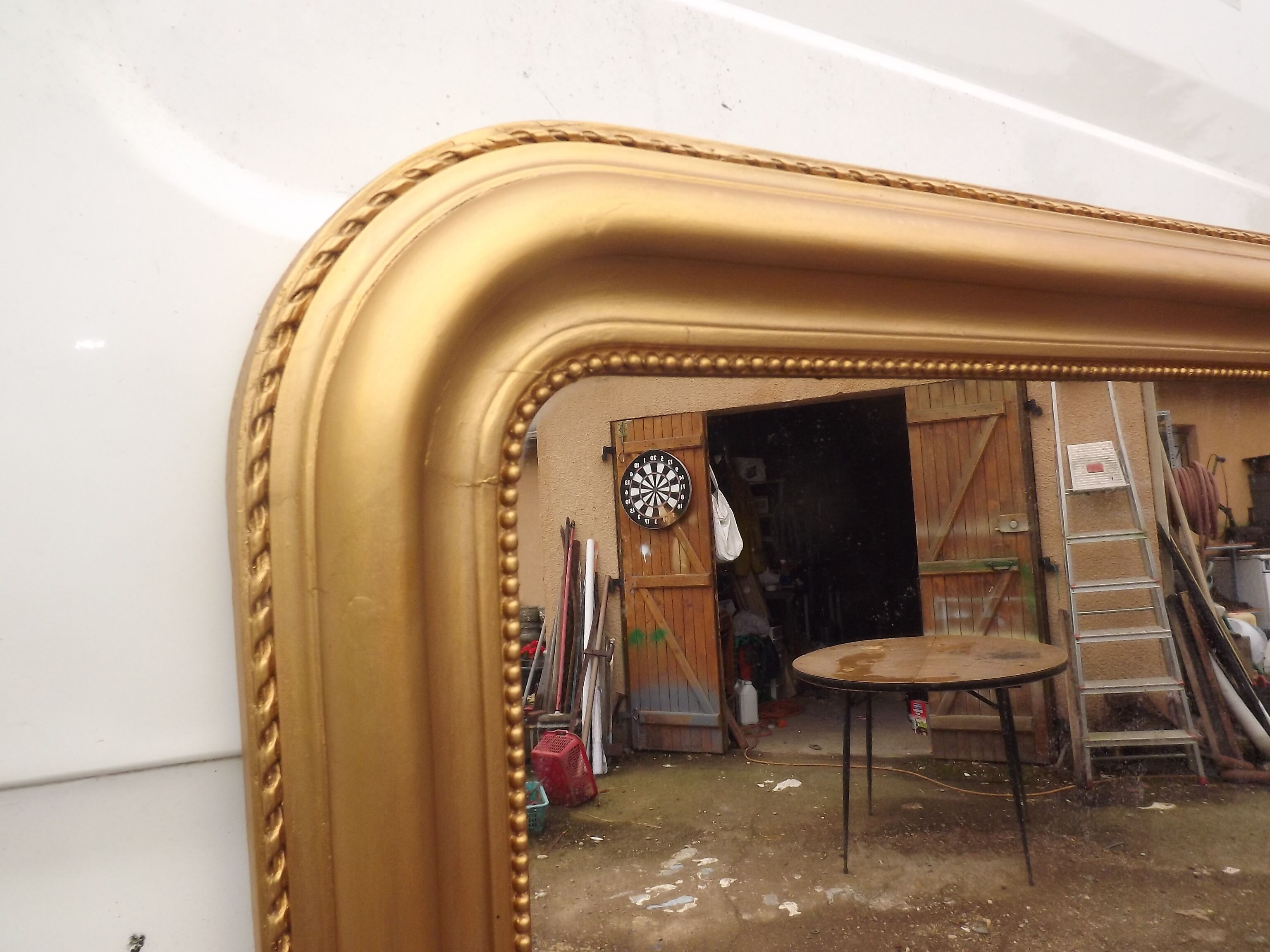 Golden mirror XlXth wood and stuk