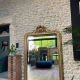 Antique Louis-Philippe mirror with pediment and gilt beading