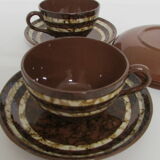 Set 4 cups and 7 under cups mary