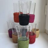 set of 9 small glasses with colored rattan support from the 70s