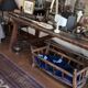 Large console or shop sideboard in pitch pine, early 20th century.