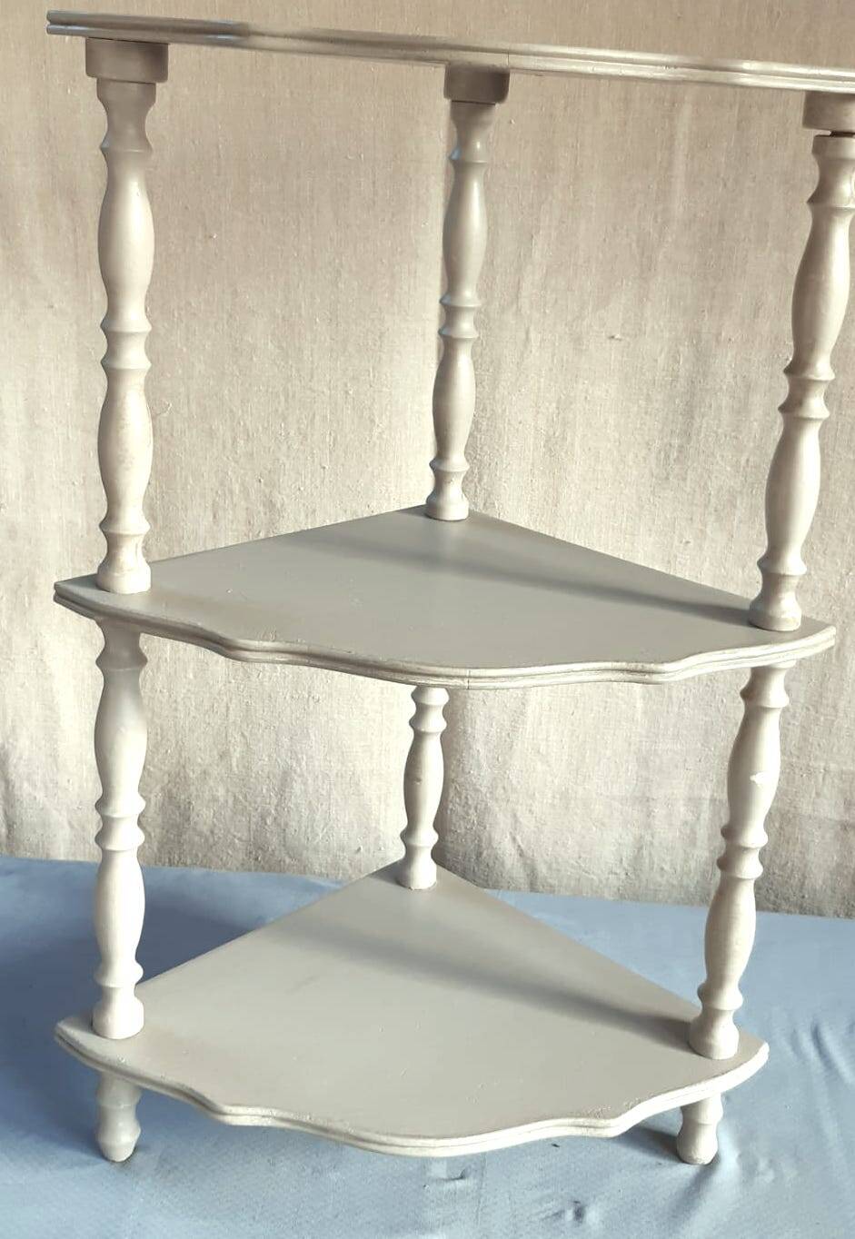 pedestal table with 3 shelves in beige painted wood