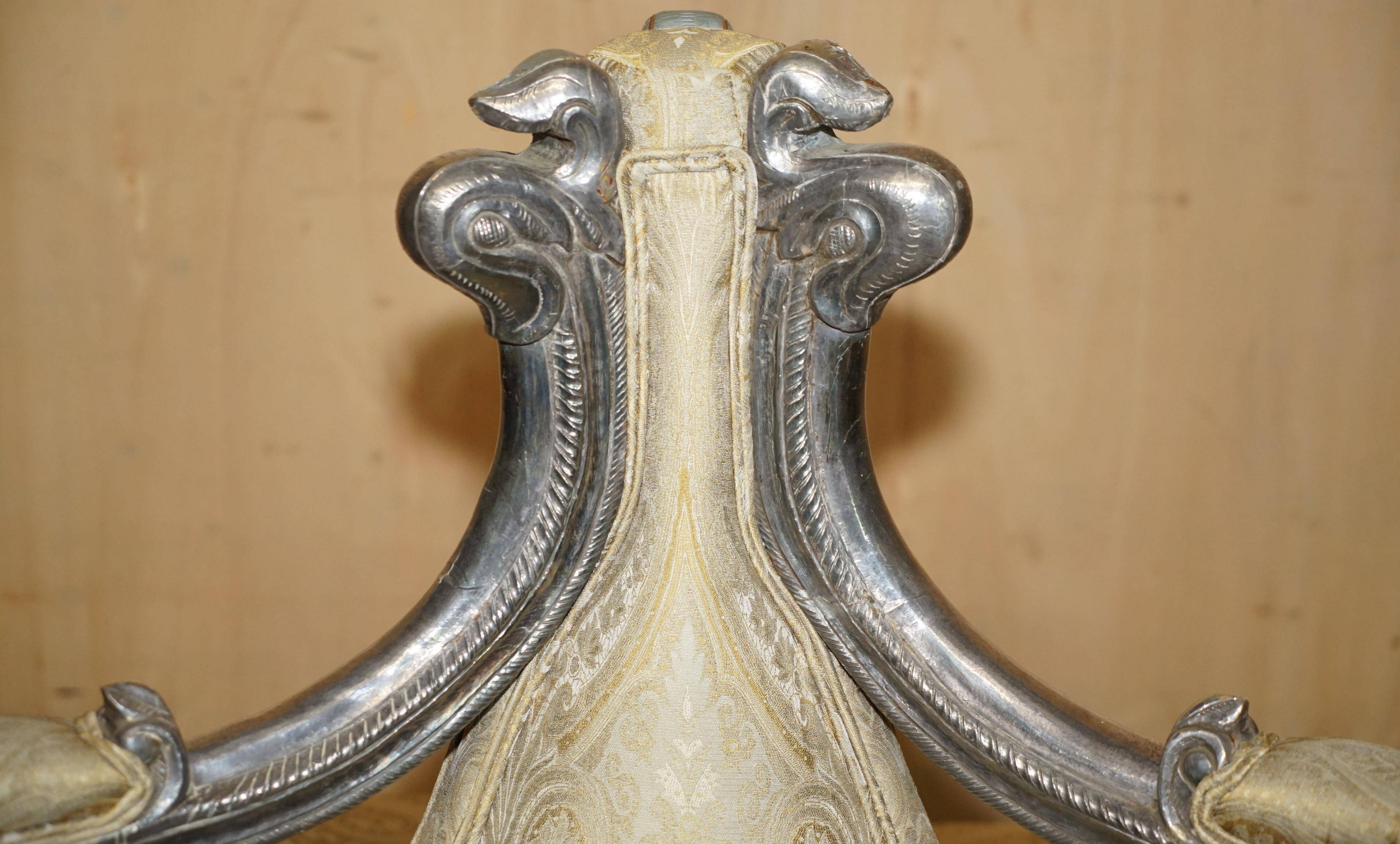 Silver-plated sculpted "Tete a Tete" canapé conversation, antique 19th century.