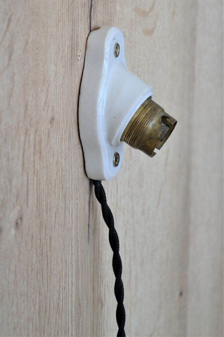 Oval porcelain hook to plug into socket