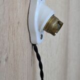 Oval porcelain hook to plug into socket