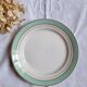 Pitted old flat earthenware plates with gold