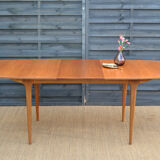 Single extension dining table by McIntosh