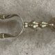 Brass fireplace tools in the style of Maison Baguès.