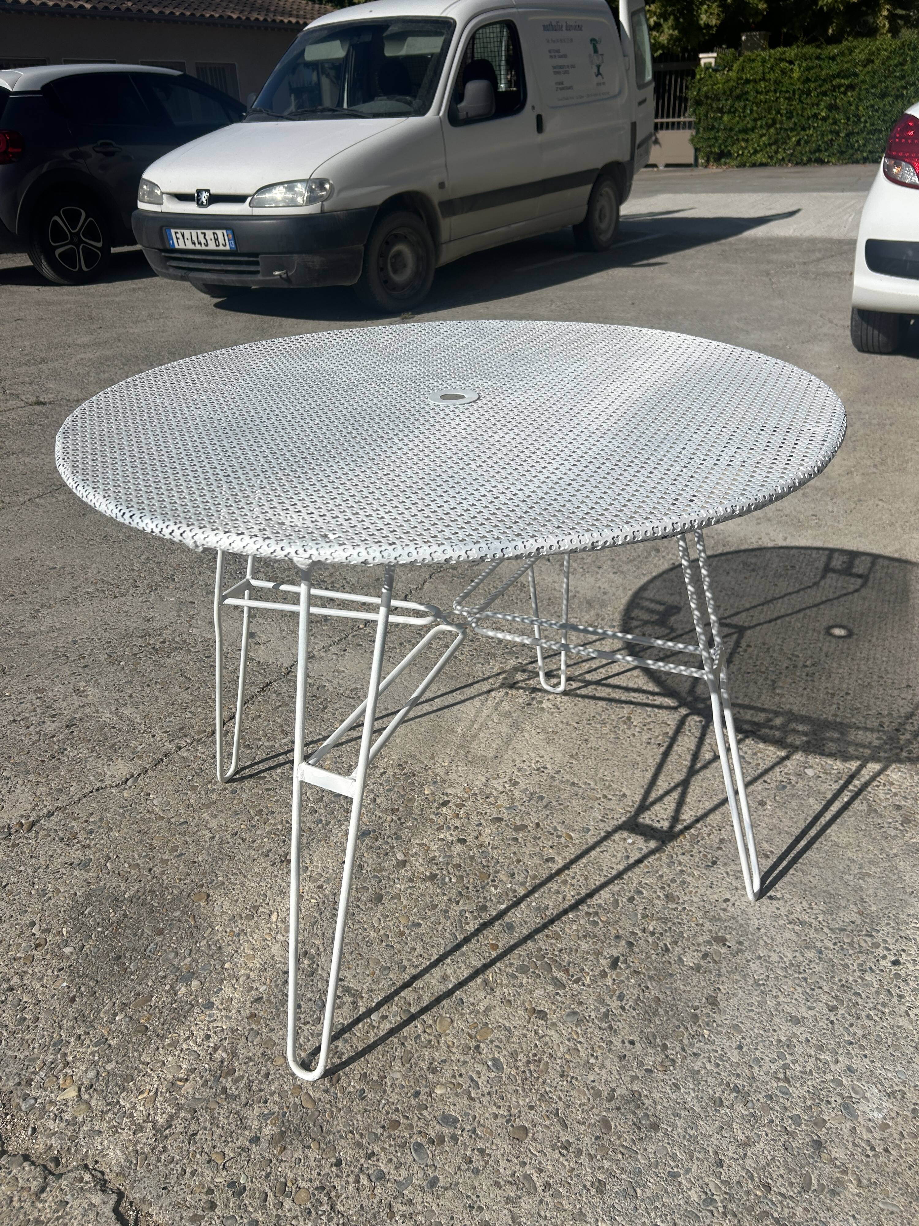 Garden table attributed to Mathieu Mategot from the 1950s.