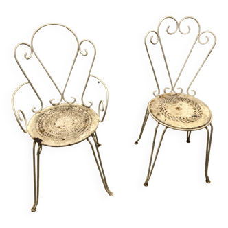 Two wrought iron garden chairs