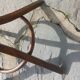 dark-coloured wooden coat rack parrot