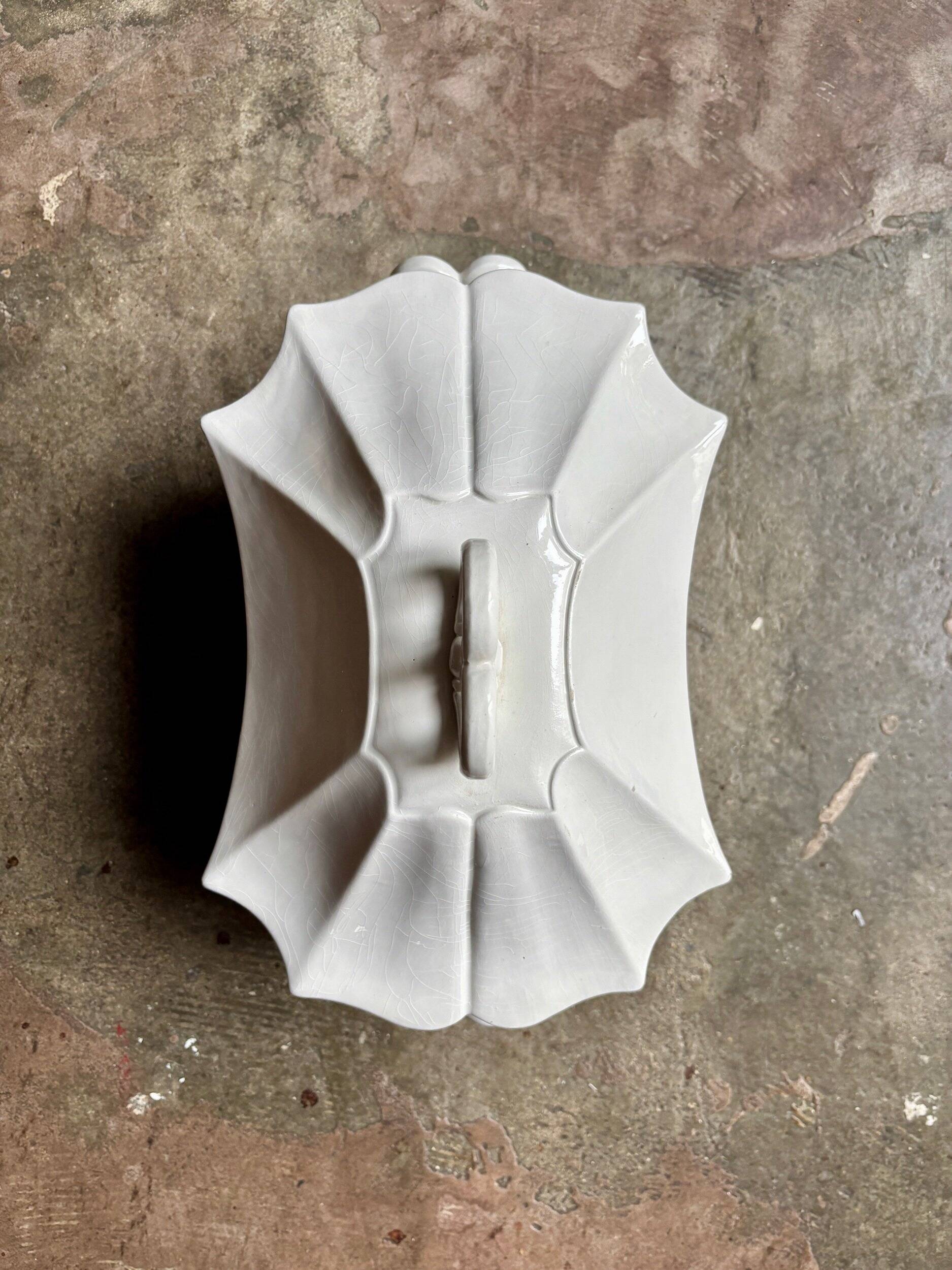 Centerpiece, white earthenware soup tureen