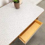 Vintage wooden dining table with formica top