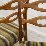 Set of four oak and wool dining room chairs by Henning Kjaernulf, 1960's