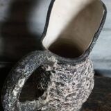 Ceramic pitcher with a handle 1950