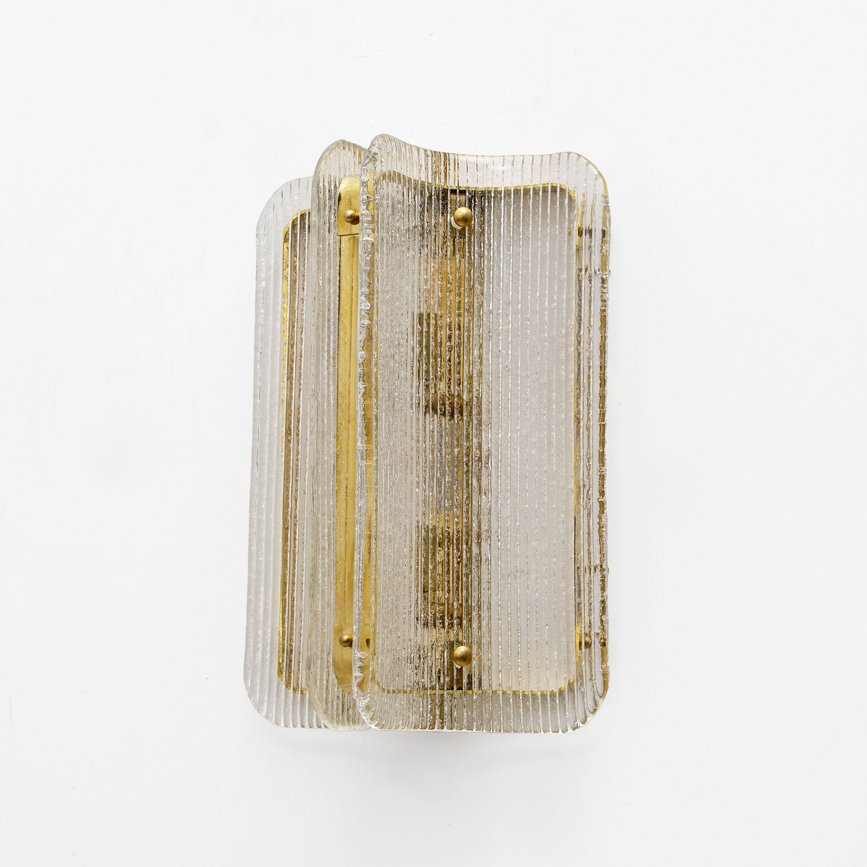 Pair of Curved Clear Ribbed Murano Glass and Brass Wall Sconces