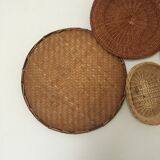 Wall composition of 8 baskets and wicker trays.