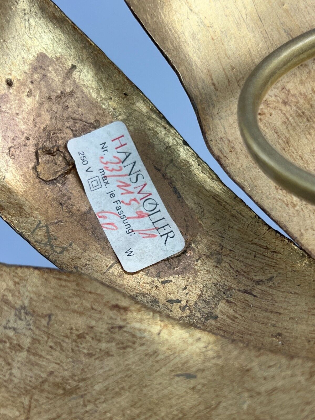 Wall sconce in brass