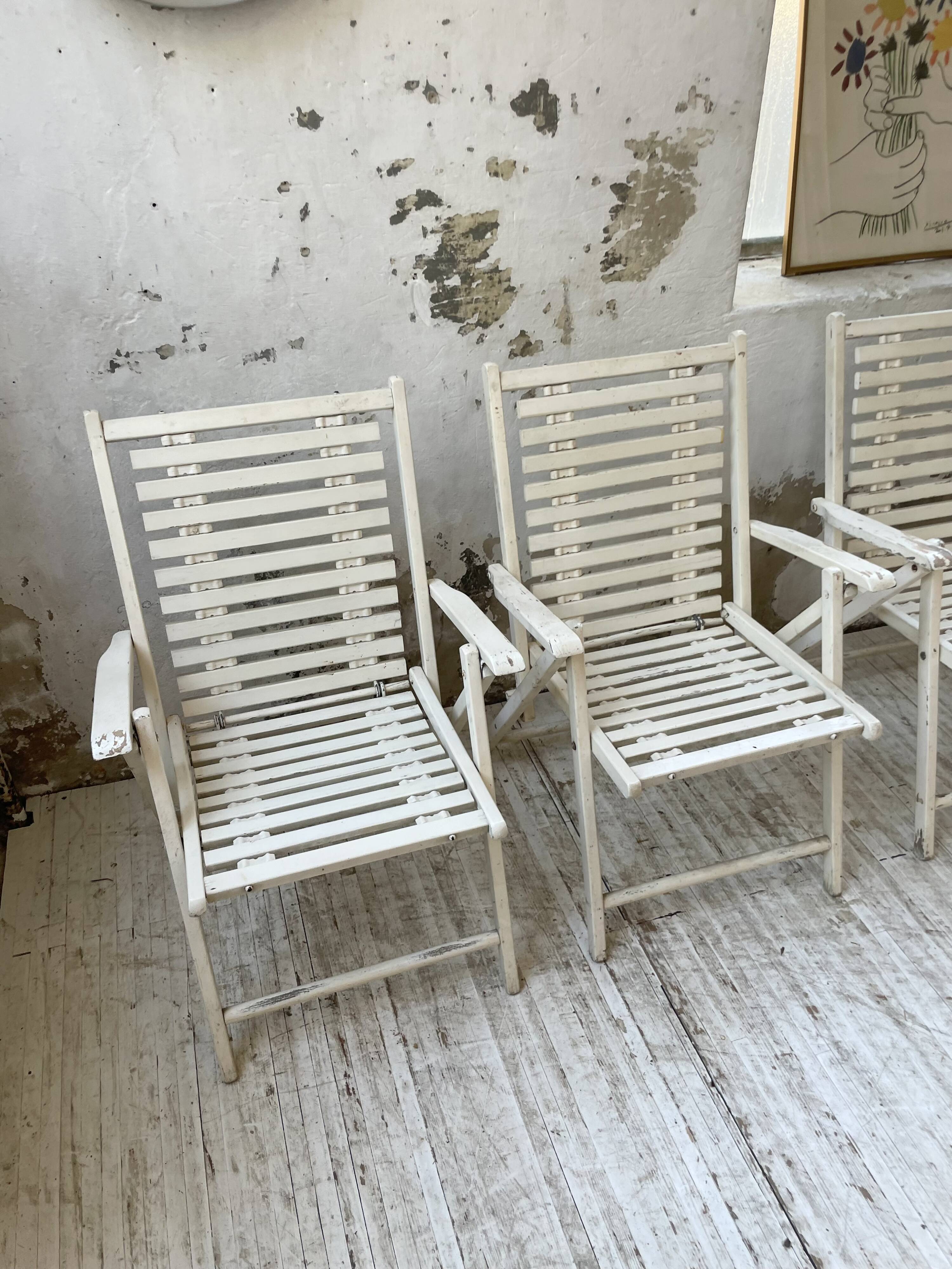 4 white wooden garden chairs