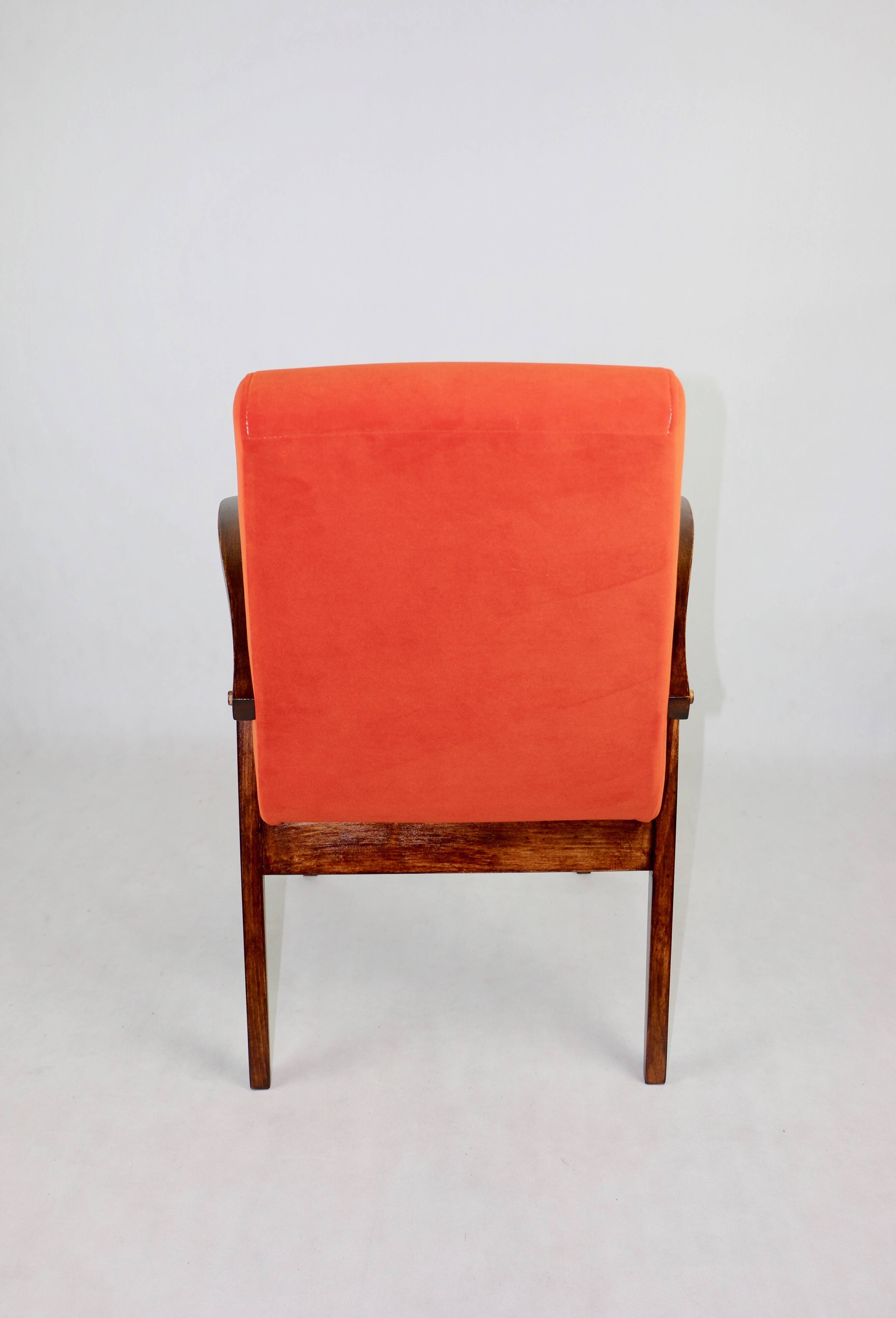 Vintage armchair 300-123, design by M. Puchała, orange - available 2 pieces