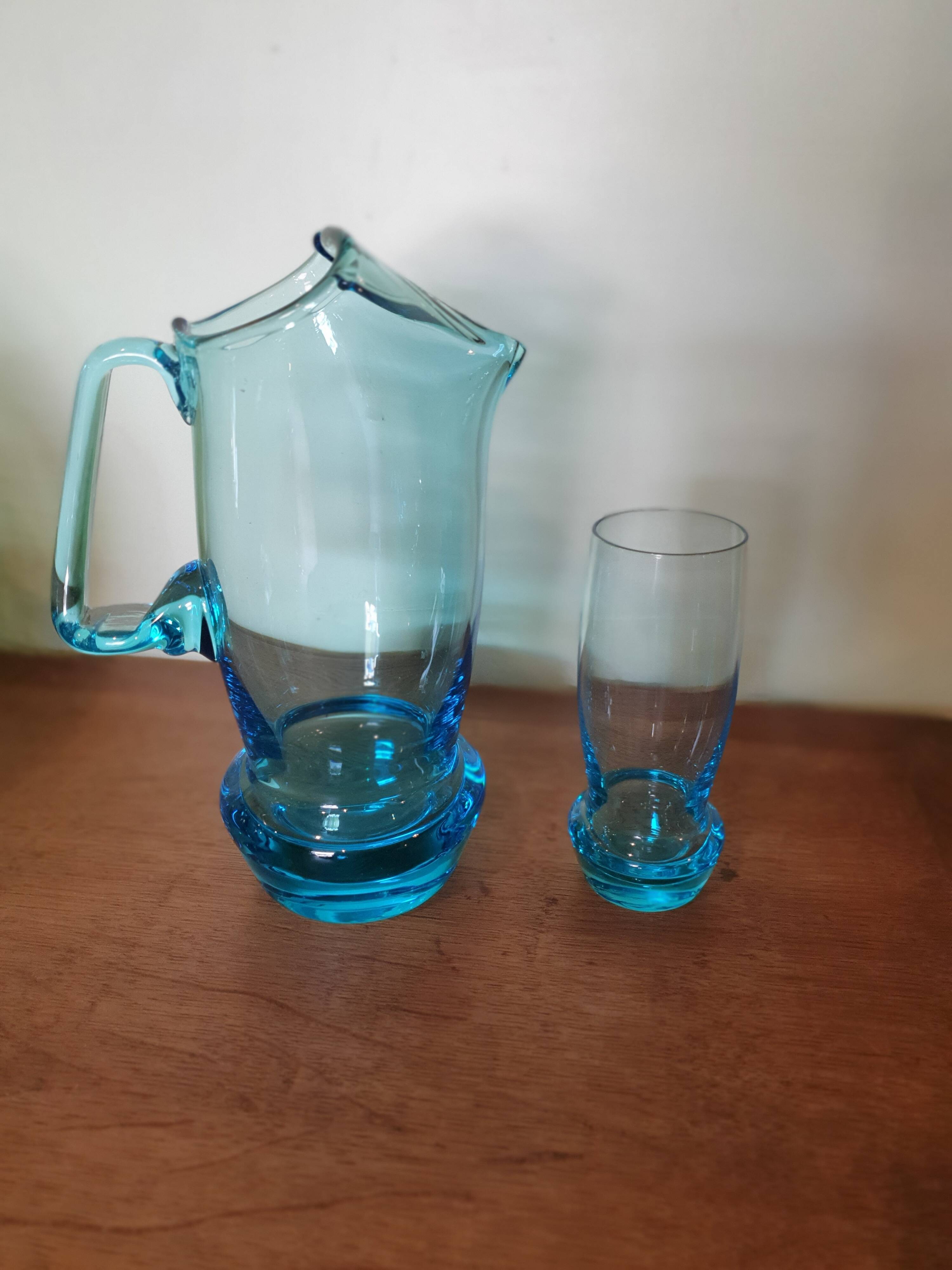 Pitcher and glass