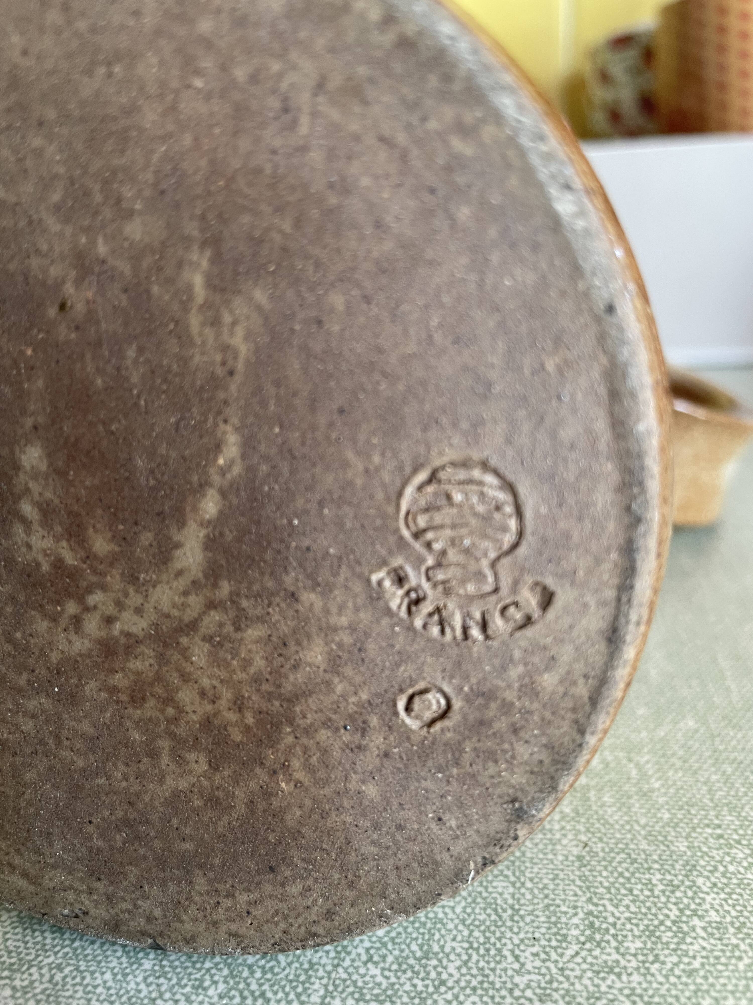 Signed sandstone decanter