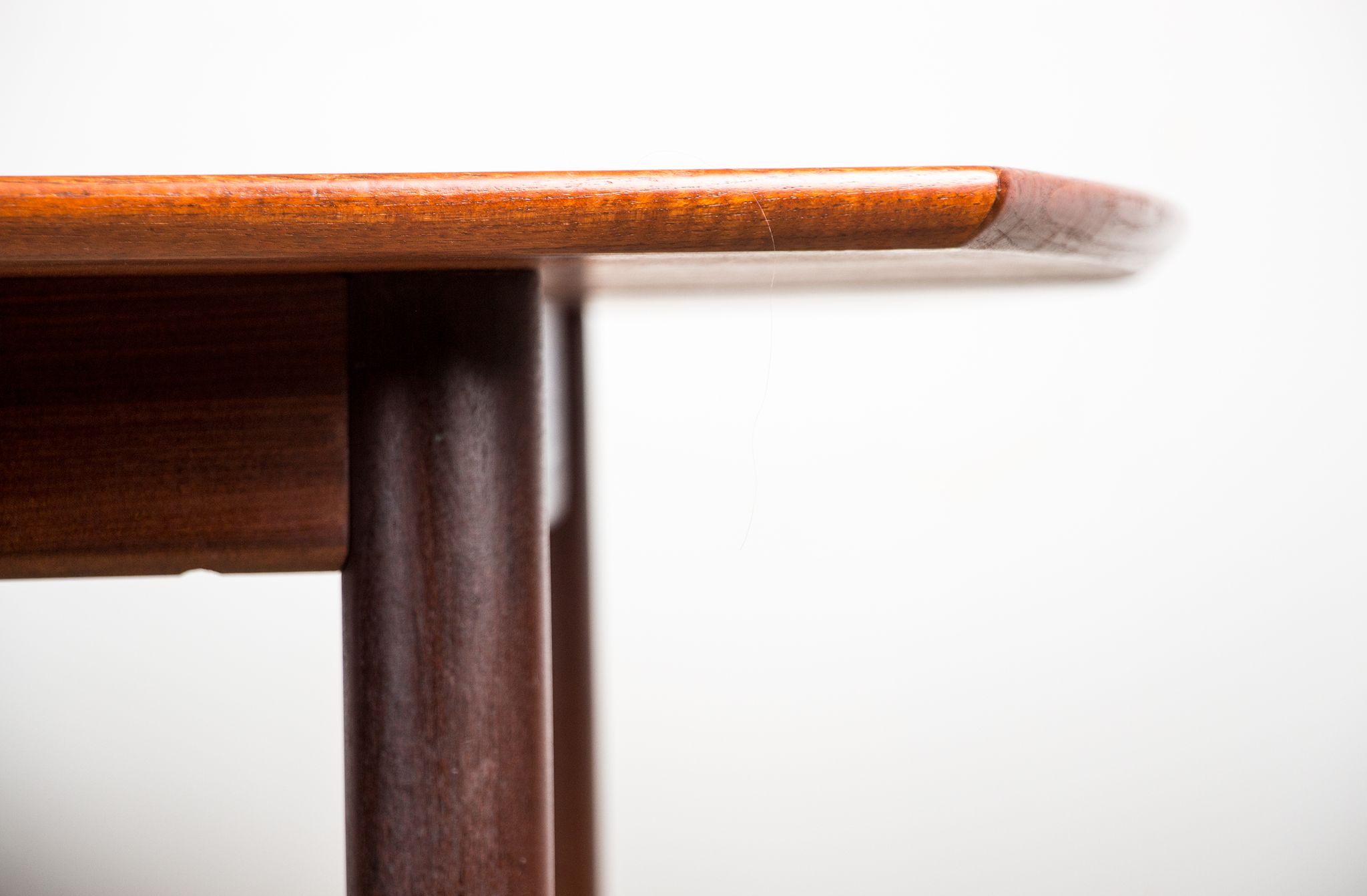 Expandable square teak dining table by Henry Walter Klein 1960
