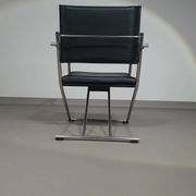 2 chaises pliantes en cuir chromé