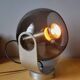 Space age lamp in chrome metal and smoked glass from the 1970s.
