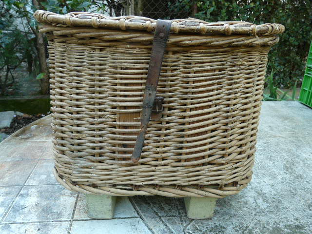 Old fishing basket rattan wood and leather