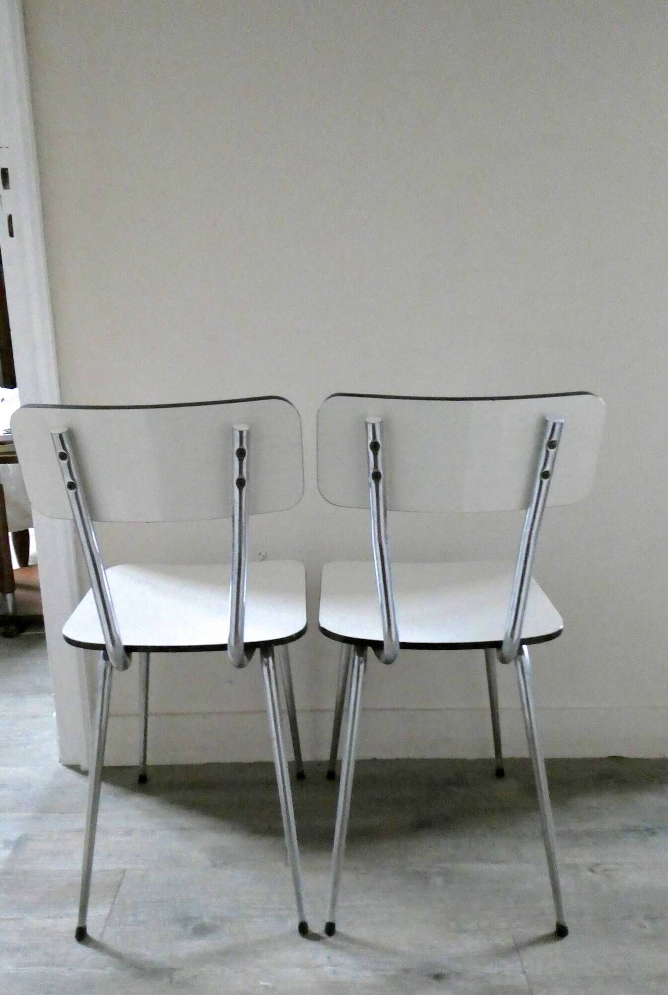 Pair of white formica and slender feet of the 60s Chair
