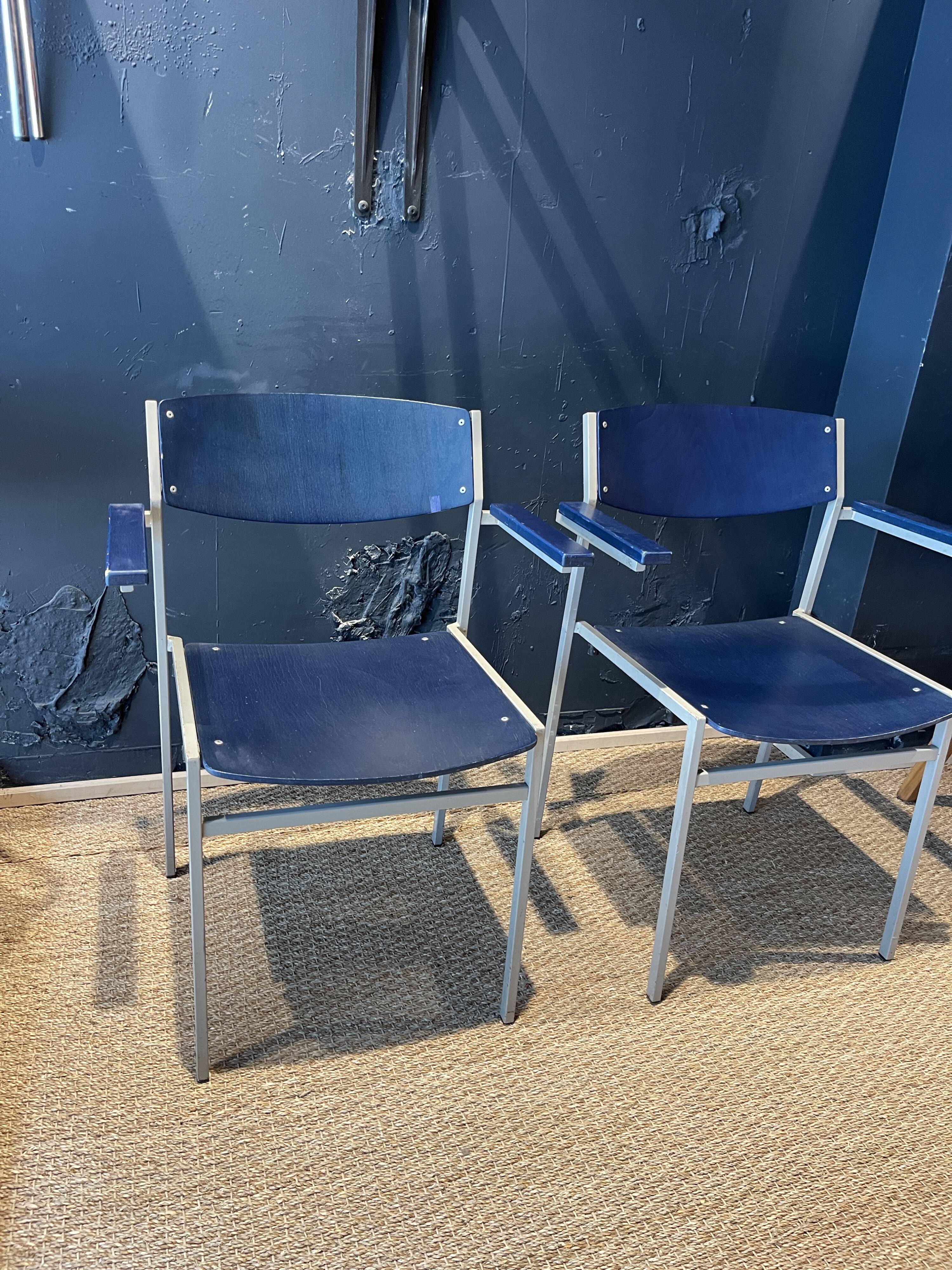 Pair of Gijs Van Der Sluis chairs with armrests in blue with grey steel legs