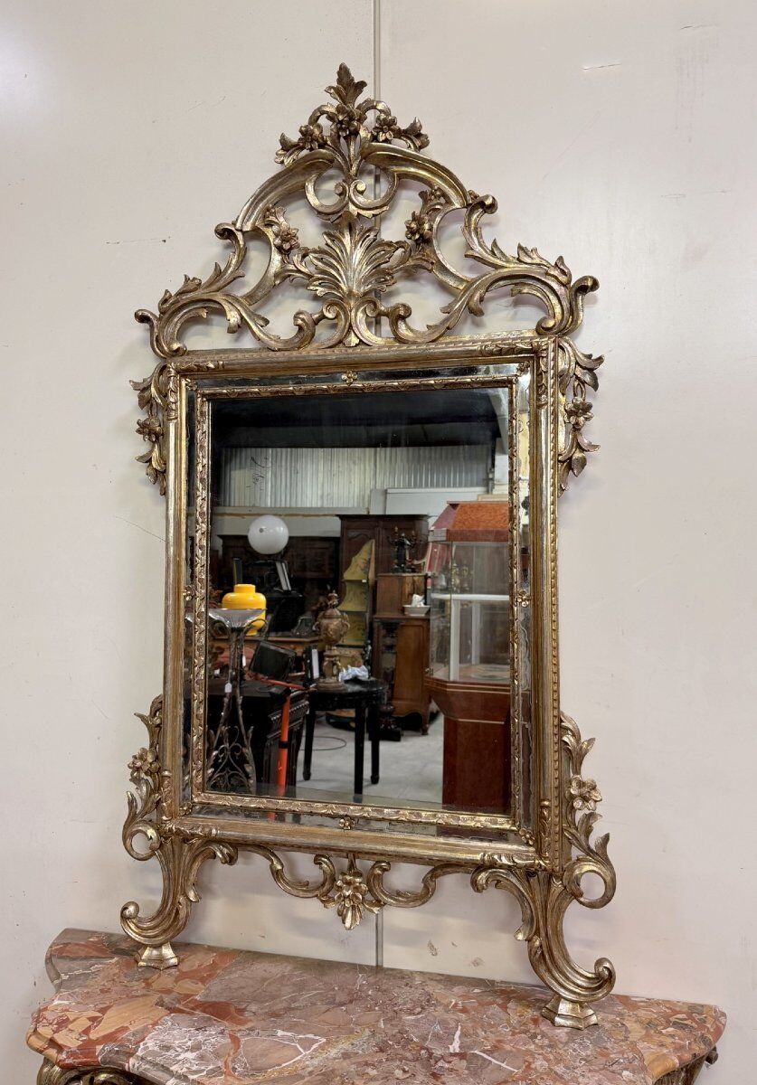 Important console table with a curved shape + Louis XV style mirror in gilded and silvered wood.