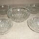 Lot salad bowl and 4 cups in pressed molded glass