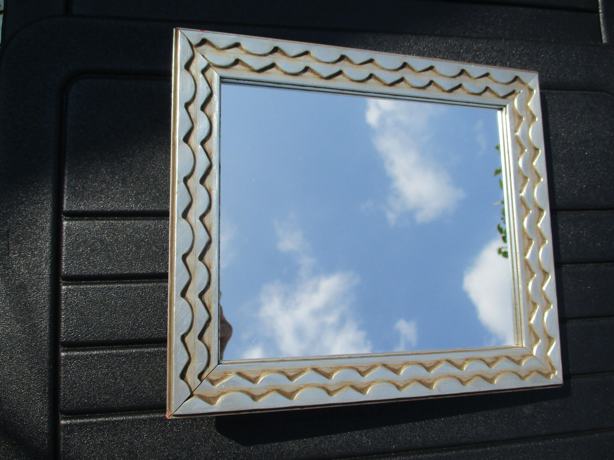 Mirror framing silver carved wood