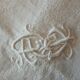 Nappe et ses 12 serviettes damasees décors floral rocaille  brodé monogramme