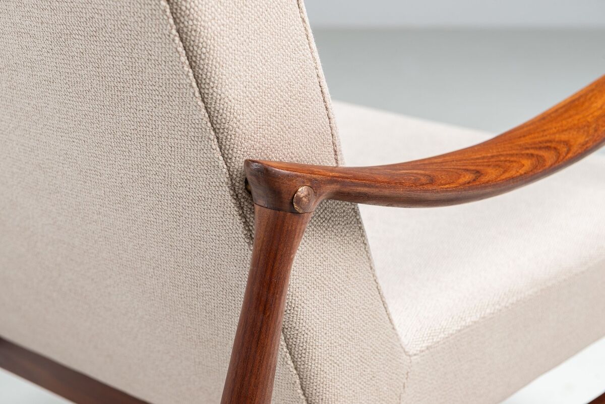 Sculptural Danish lounge chair in teak and fabric Denmark 1960