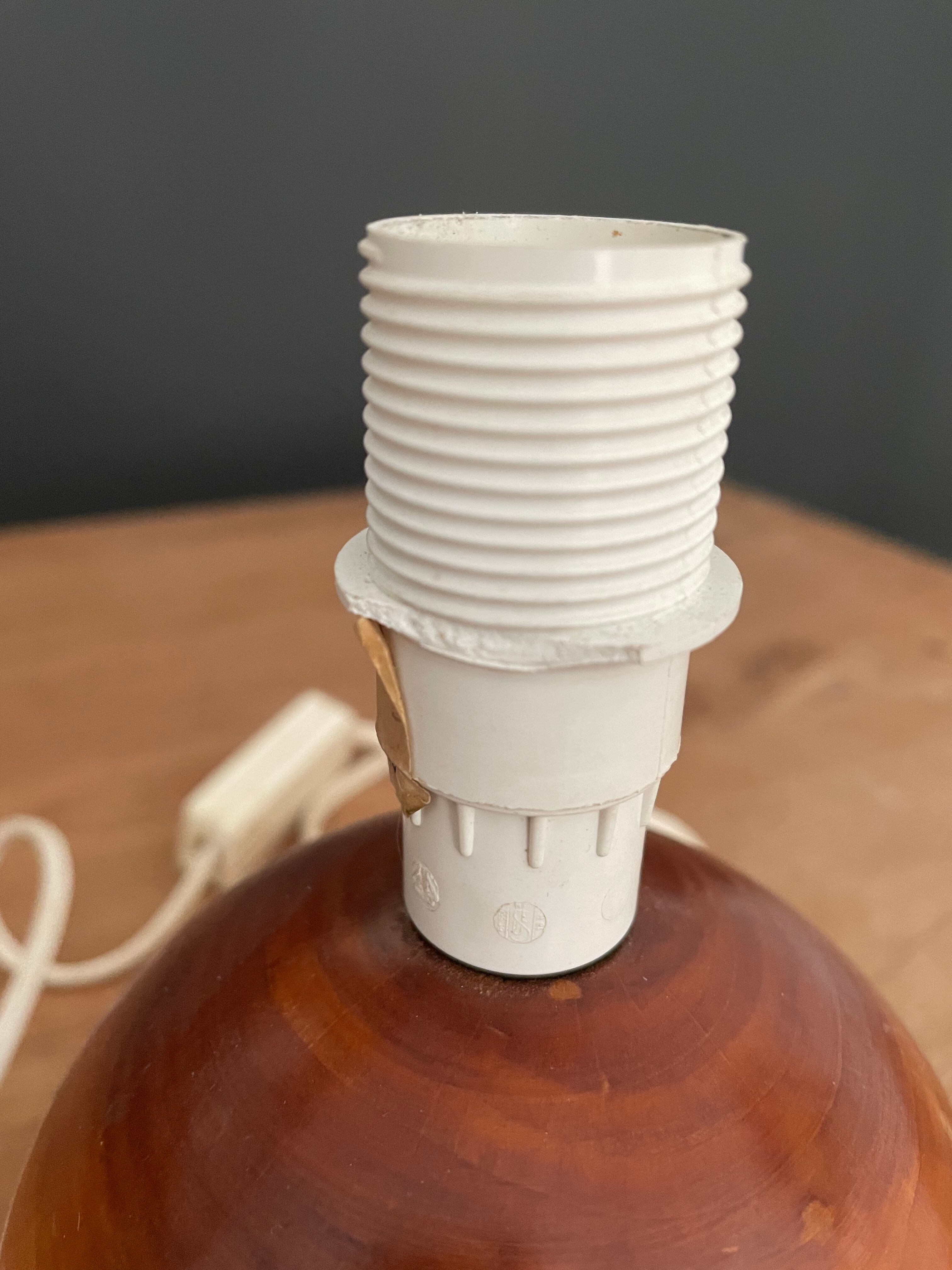 Turned wooden table lamp
