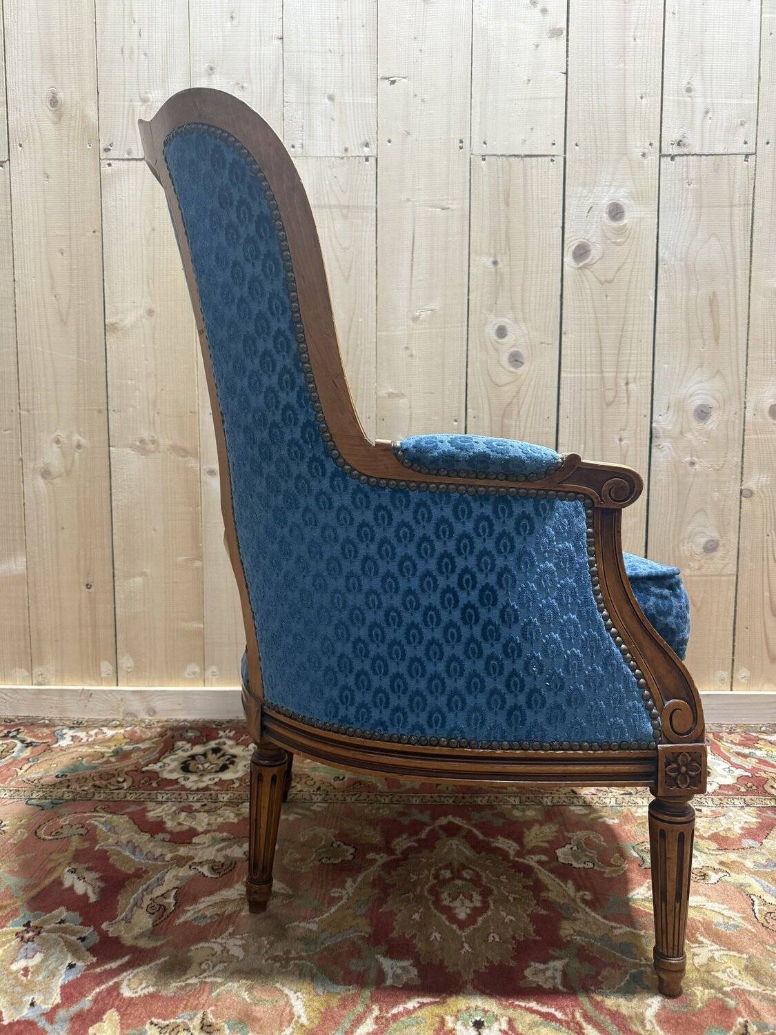 Louis XVI style blue velvet wingback armchair