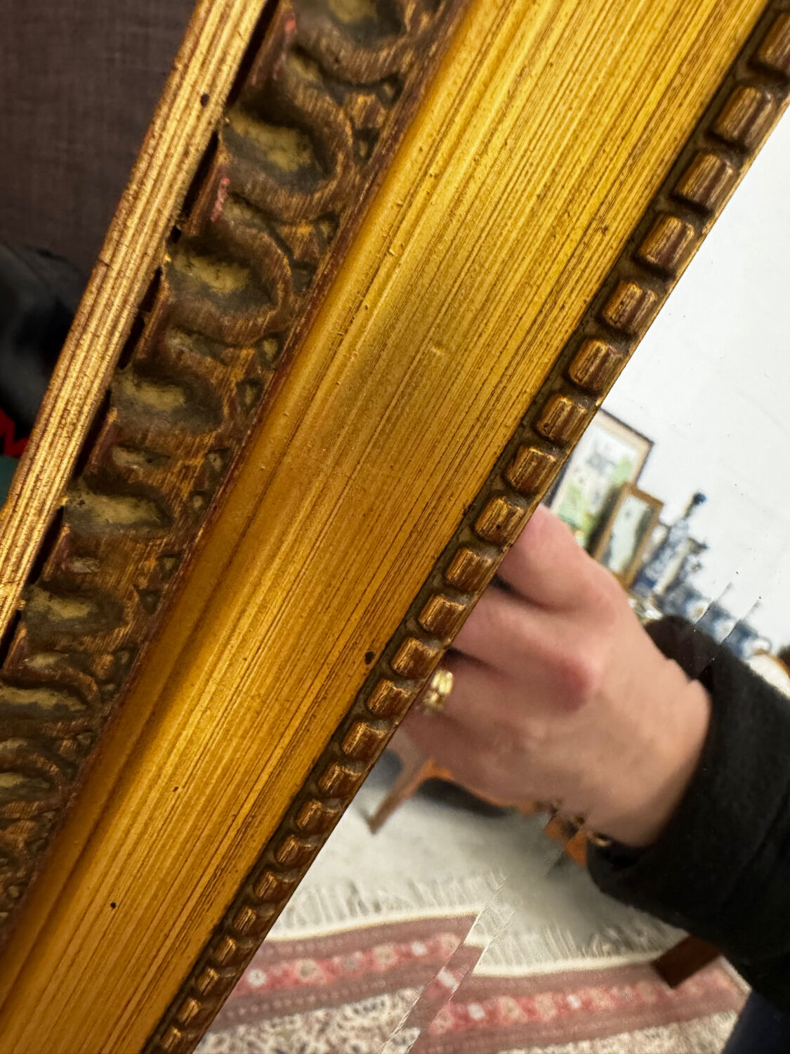 Large gold mirror in the Louis XVI style