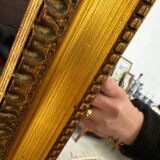 Large gold mirror in the Louis XVI style