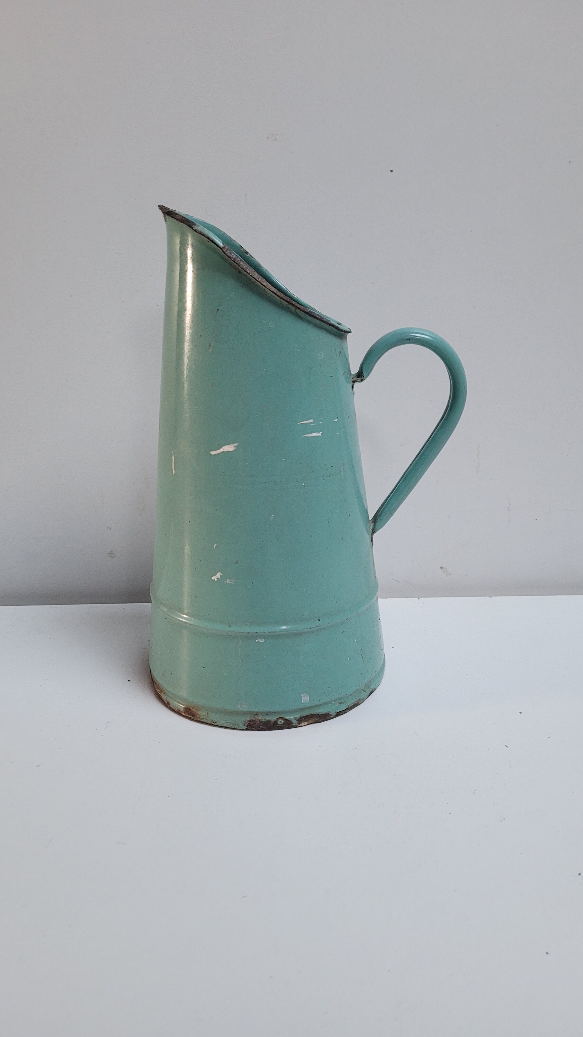 Green enamelled pitcher