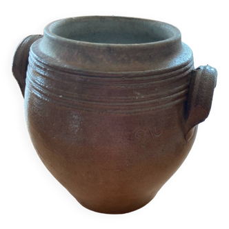 Old brown stoneware pot