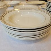 Table service in opaque porcelain with gold leaf.