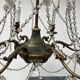 Louis XVI style chandelier with a pearl garland and painted tin, 20th century.