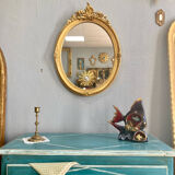 Miroir oval en bois doré 70x49cm