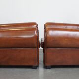 Very beautiful complete set consisting of a sheepskin leather sofa and two armchairs in cognac color