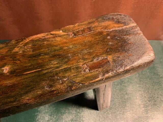 Antique milking stool in rustic curved wood, 19th century