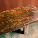 Antique milking stool in rustic curved wood, 19th century