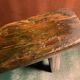 Antique milking stool in rustic curved wood, 19th century